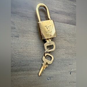 Authentic Louis Vuitton Gold Padlock with two keys #304
